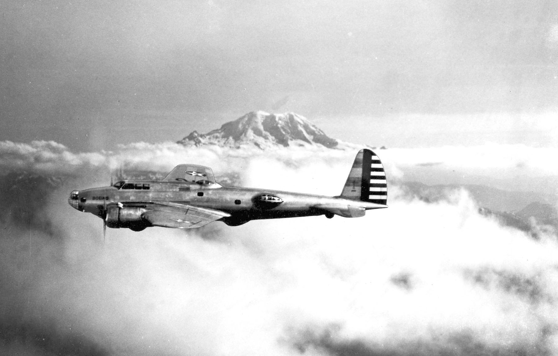 The Boeing Model 299, NX13372, photographed with Mount Rainier in the background, July 1935.